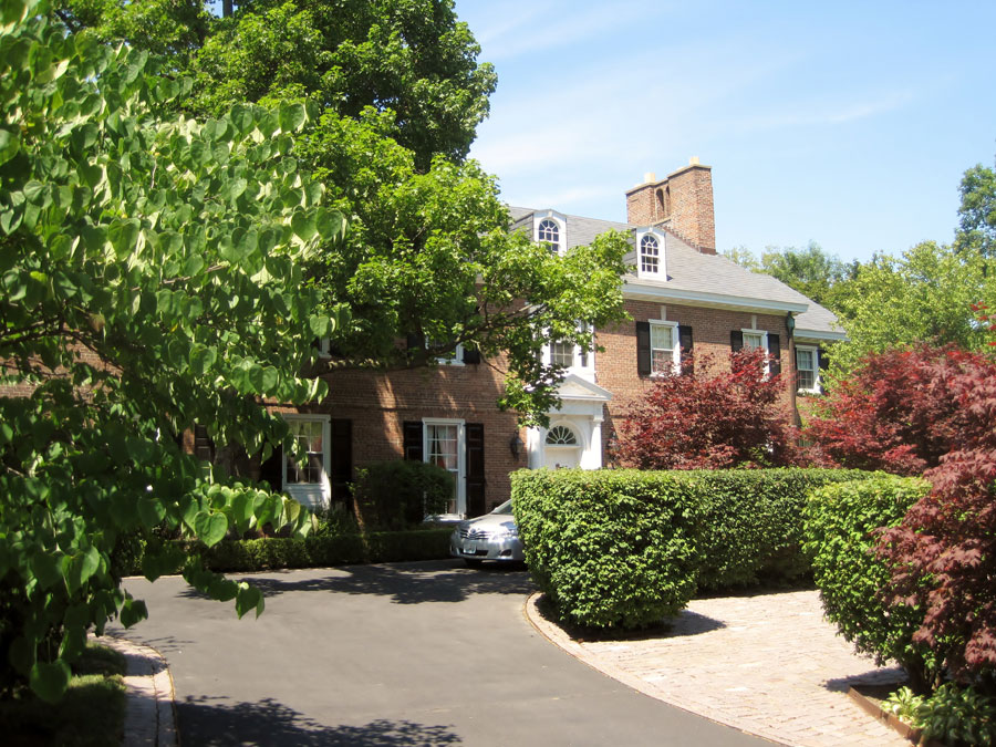 brown house with frontyard